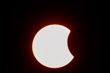 Partial solar eclipse at sunset