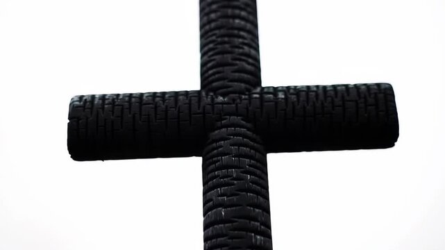 Black Cross Symbol Against White Sky Religious Christian Faith.
