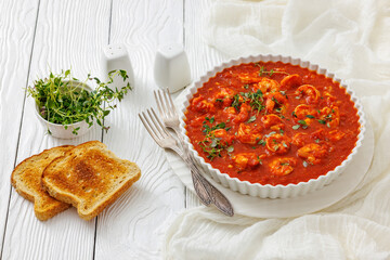 Shrimp in hot tomato sauce with garlic, onion