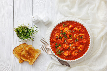 Shrimp in hot tomato sauce with garlic, onion