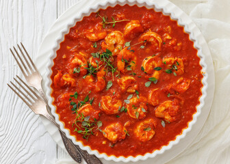 Shrimp in hot tomato sauce with garlic, onion