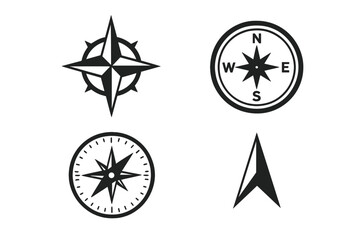 Different designs of compasses showcasing directional symbols and styles in black and white