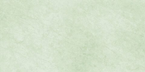 Polished natural granite marble for ceramic wall tiles. soft natural patterns, and a smooth polished stone surface. green paper texture. light green polished plaster rough concrete wall background.