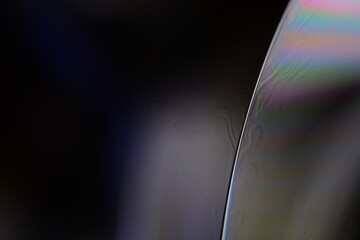 	
Glossy fluid films, minimalistic background, flat waves, futuristic abstract, liquid surface	