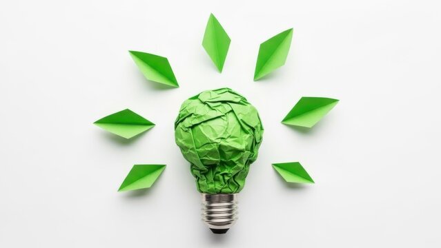 Green origami lightbulb idea symbolizing eco innovation isolated on white background