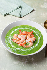 Green broccoli soup with shrimp. Vegetarian food. Healthy eating.