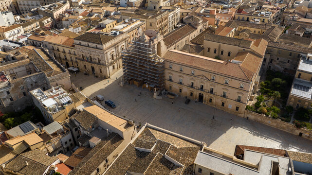 Aerial view of the Cathedral of Syracuse, formally Metropolitan Cathedral of the Nativity of the Blessed Virgin Mary. It's located in the center of the city, on the island of Ortygia, Sicily, Italy.