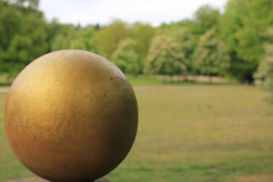 Gold Sphere in Park
