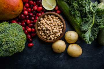 Fresh vegetables, legumes and fruits rich in vitamins — healthy vegan ingredients