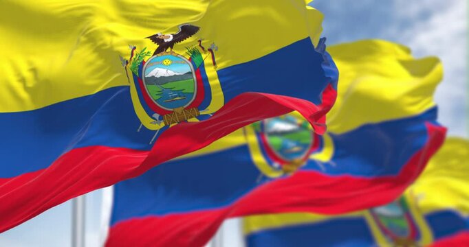 Ecuador national flags waving in the wind on a clear day