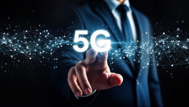 Businessman in suit touching glowing 5g text symbol surrounded by digital network connection particles on dark background representing future telecommunication technology