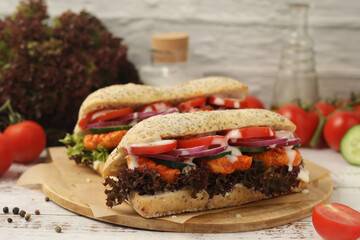 Baguette sandwiches with chicken and fresh vegetables	