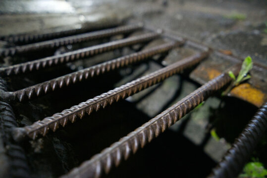 Public drain on a road in the city center