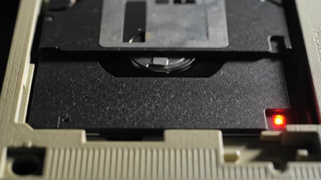 Extreme Close Up Inserting Disk In Floppy Disk Drive