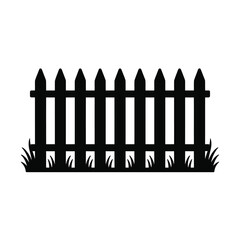 Black silhouette of a wooden picket fence with grass