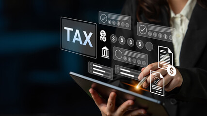 A professional engages with a tablet displaying tax management tools, digital documents, and financial icons, showcasing modern technology in business. Gantry