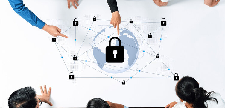 A diverse team collaborates on cybersecurity solutions, pointing at a digital illustration of a globe with locks, representing global network security and protection. Gantry