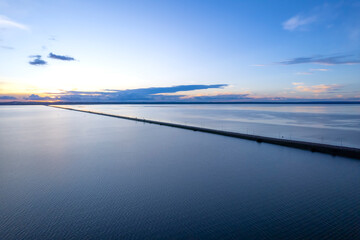 Beautiful aerial view of Palmas city skyline and Tocantins river bridge on a summer day. The newest capital in Brazil. Concept of architecture, urban, modern, travel, tourism, destination.