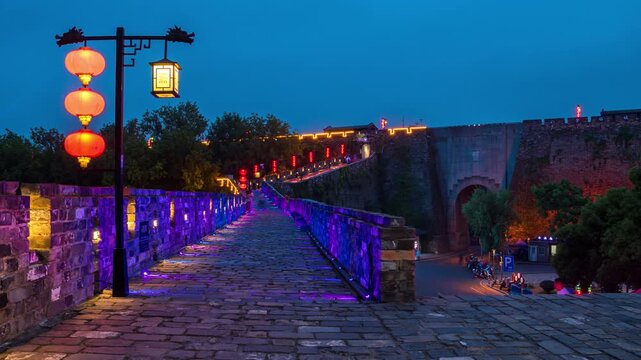 Nanjing Ming Dynasty City Wall at Night with Traditional Chinese Lanterns and Purple Illumination