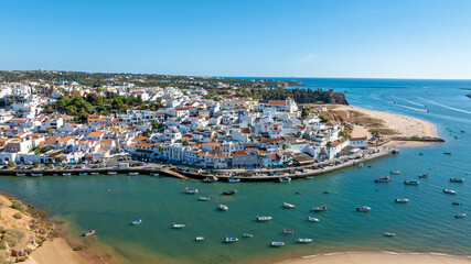 Aerial from the traditional touristic town Ferragudo in the Algarve Portugal