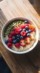 Healthy Oatmeal Bowl with Fresh Berries and Seeds.
