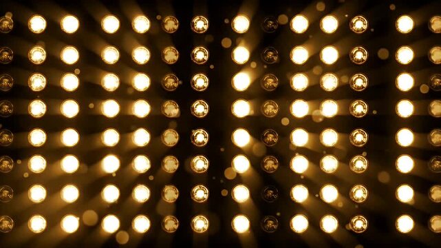 Symmetrical Grid of Warm Yellow Stage Lights Forming Two Vertical Columns Against a Dark Background
