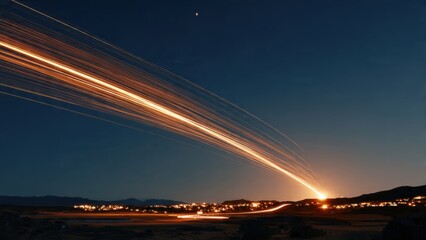 Stunning Long Exposure Photography of Glowing Light Trails Over Cityscape at Night with Clear Starry Sky