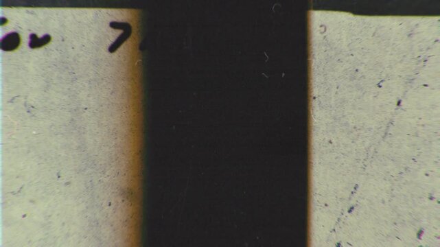 Looping microfiche scan transition in vertical and horizontal formats. Perfect for blending modes, archival looks and retro visual design.