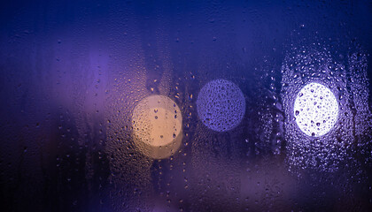 A dazzling disco sphere reflects the starlit night sky, mimicking a miniature galaxy in the dark cosmos of the club