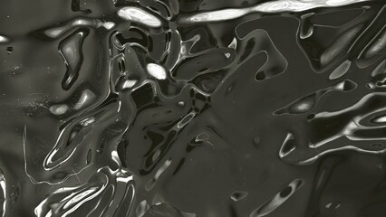 close-up of dark viscous liquid surface with rippled waves glossy sheen and reflective highlights on abstract black texture