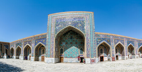Uzbekistan architecture in Samarkand and Bukhara with intricate mosaics blue domes ancient madrasas Islamic patterns historic monuments vibrant tilework and cultural heritage in bright daylight