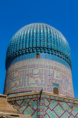 Uzbekistan architecture in Samarkand and Bukhara with intricate mosaics blue domes ancient madrasas Islamic patterns historic monuments vibrant tilework and cultural heritage in bright daylight