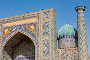 Uzbekistan architecture in Samarkand and Bukhara with intricate mosaics blue domes ancient madrasas Islamic patterns historic monuments vibrant tilework and cultural heritage in bright daylight
