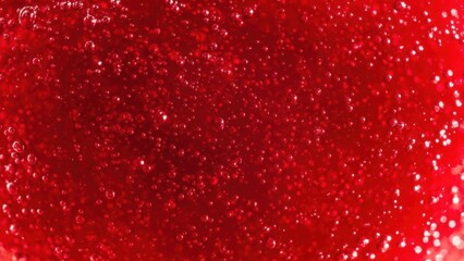 Close up of vibrant red caviar with tiny glistening eggs