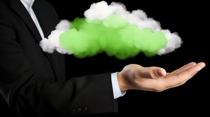 Businessman holding glowing green cloud representing eco cloud computing