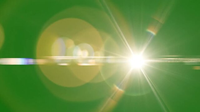 A burst of light illuminating a vibrant green background, perfect for adding a touch of brilliance and energy to any design project or creative endeavor