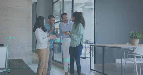 Holding tablet, coworkers wearing business wear discussing data in modern office, teal overlay