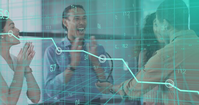 Clapping team witnessing handshake in office in business attire with digital 3D grid and line graph