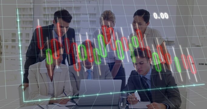 Analyzing team of six wearing suits around laptop in meeting room, displaying candlestick overlay