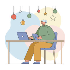 Woman works on laptop and tablet multitasking at a desk decorated for the holidays