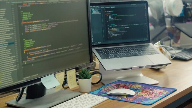 Programmer Desktop Computer Workspace with Dual Monitors and Coding Development Setup