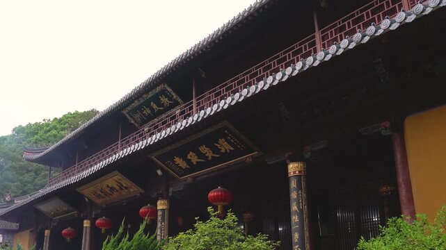 Puji Temple at Putuoshan Buddhist Mountain - Traditional Chinese Architecture with Red Lanterns and Golden Calligraphy