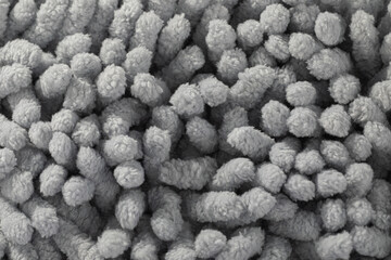 Close-up view of a gray mop. A macro shot of a gray floor mop which seems like a biological structure.
