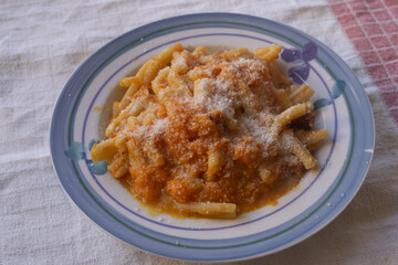 pasta with tomato sauce and parmesan cheese