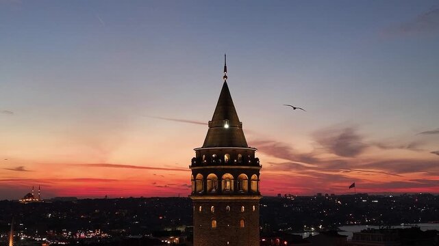 Galata Tower in the Sunset Drone Video, Istanbul Silhouettes Background, Galata Beyoglu, Istanbul, T&uuml;rkiye (Turkey)