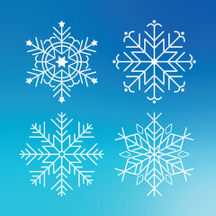 Set of Four Intricate White Snowflakes on a Blue Gradient