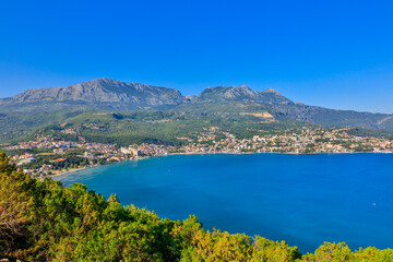 Fototapeta premium Montenegro Boka Kotorska Bay city view on a cloudy summer day