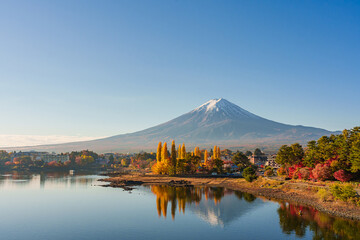 Beautiful Fuji mountain and Kawaguchiko lake at sunrise, Autumn seasons at Yamanachi in Japan. © Chalearmrat