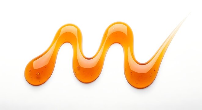 Golden honey drizzle swirl on white background