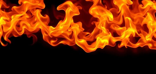 Fototapeta premium Intense orange and yellow fire flames against a dark background, color, element